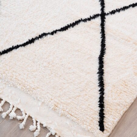 Tapis poils longs blan et noir