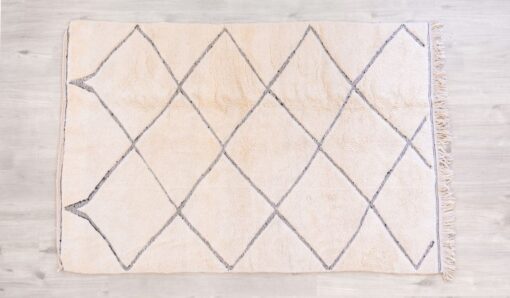 Tapis salon fibule berbère sable et noir décoration intérieur cosy