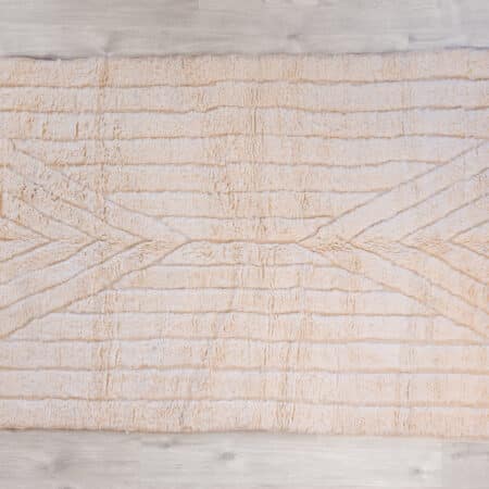Tapis en laine poils longs naturels pour décoration intimiste