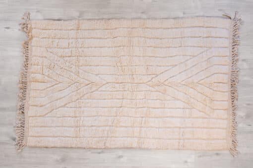 Tapis en laine poils longs naturels pour décoration intimiste
