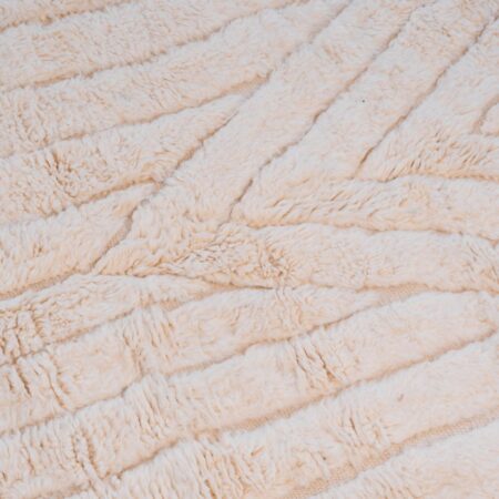 Tapis en laine poils longs naturels pour décoration chaleureuse