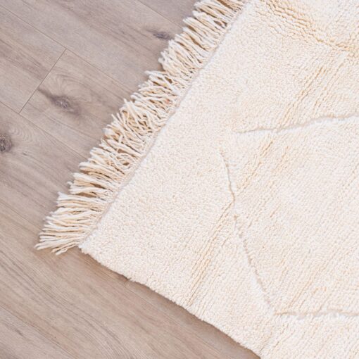 Tapis en laine salon blanc pour décorer sa maison