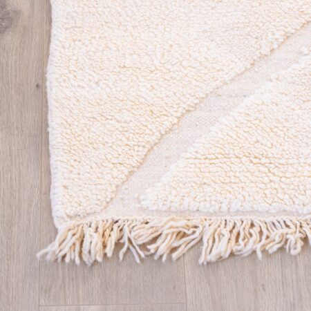 Tapis en laine poil longs blanc