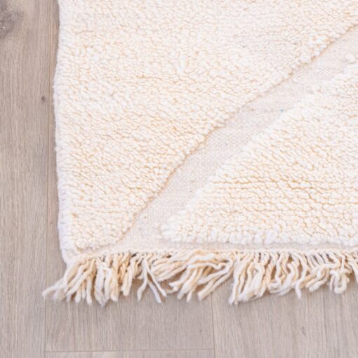 Tapis en laine poil longs blanc